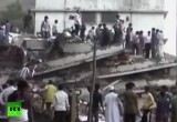 Поиски выживших на месте обрушения строящегося здания в Мумбаи, Индия. Кадр RT