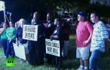 Афроамериканцы США протестуют против освобождения убийцы подростка полицейского Циммермана. Кадр RT
