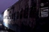 Сгоревшие вагоны поезда в Индии. Кадр NTDTV