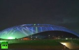 Подсветка олимпийского стадиона в Сочи. Кадр RT